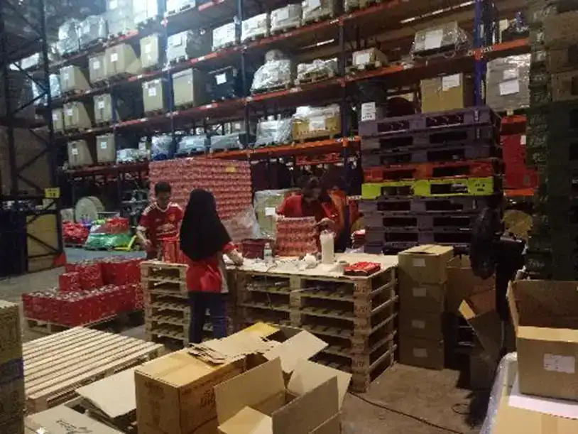 staffs packing items for transportations